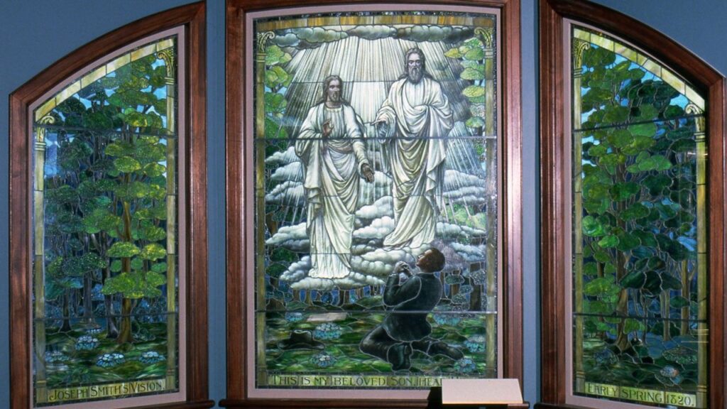 Stained glass art depicting Joseph Smith and the First Vision